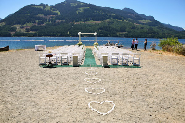 Why We Love It We love this romantic ceremony setup plus the background is