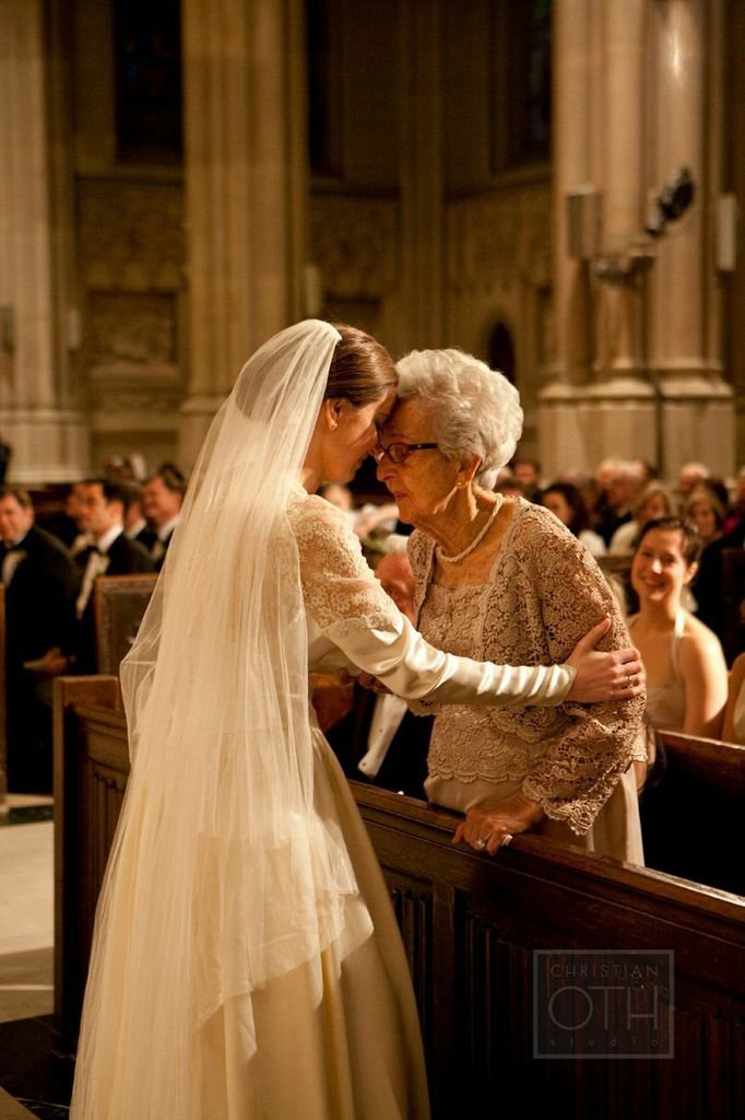 bride with grandmother during wedding ceremony