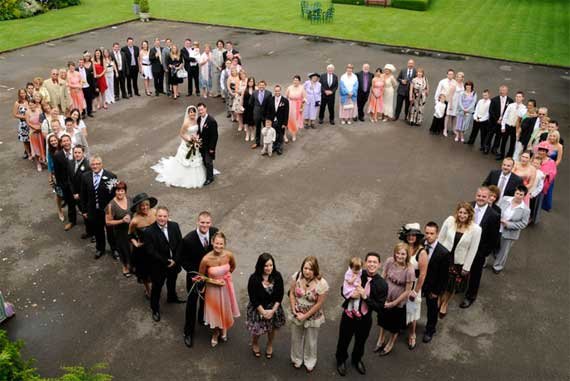 couple surrounded by family