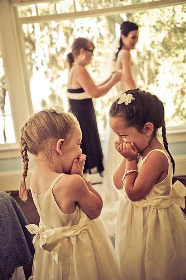flower girls adorable reactions while the bride is getting ready
