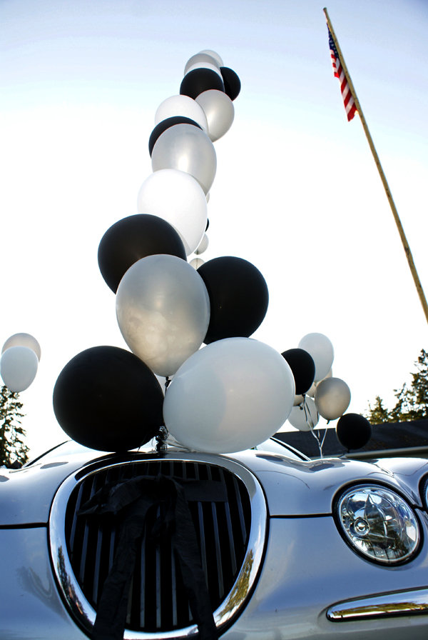 wedding getaway car with balloons