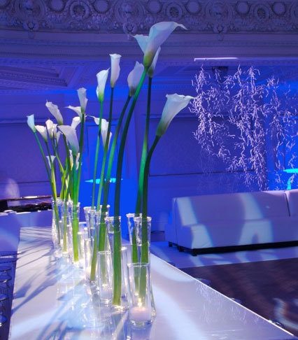 calla lily centerpieces blue uplighting Photo Credit Irja Tannlund 