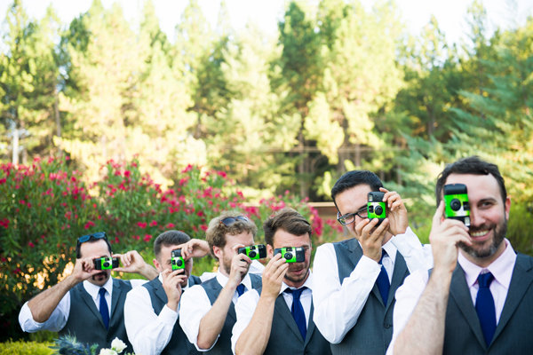 groomsmen with disposable cameras