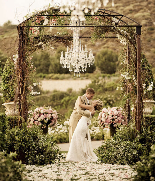 Outdoor chandeliers impart a wildly romantic appeal Photo Credit Victor 