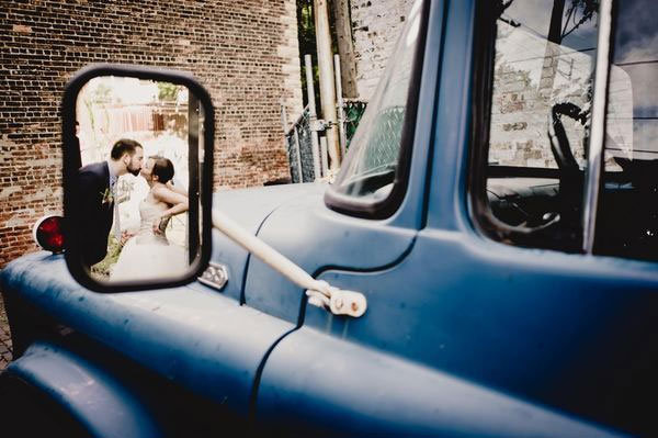 wedding photo in getaway car