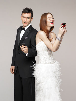 http://www.bridalguide.com/sites/default/files/article-images/etiquette/bride-and-groom-on-cell-phones.jpg