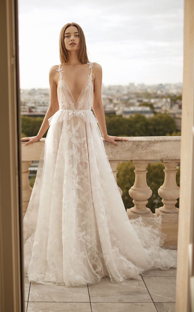 Sheer lace illusion wedding gown