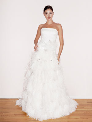 Tulle and tafetta strapless gown with ostrich feather skirt wedding dress