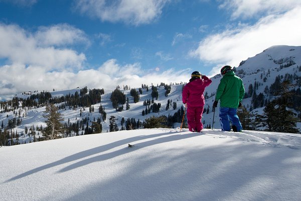 couple skiing in lake tahoe 