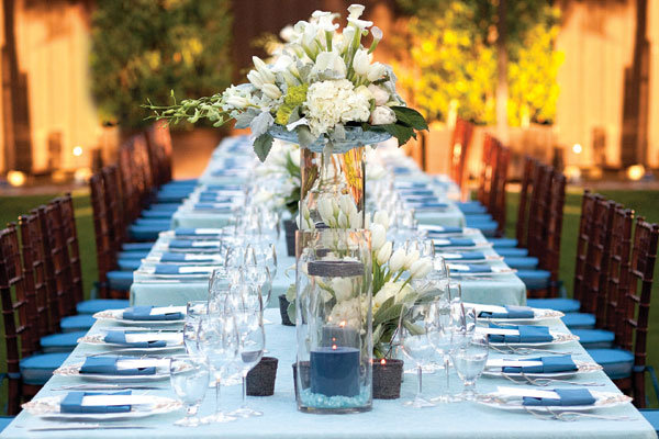 A serene setting features eightfootlong King's tables dressed in shades