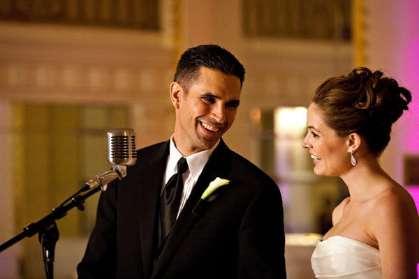 couple giving wedding toast