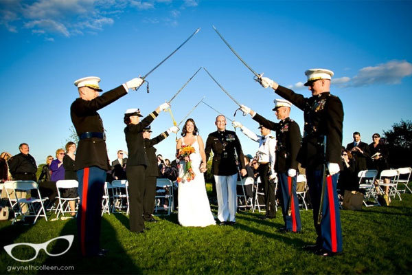 Many military weddings include a saber arch under which the bride and groom 