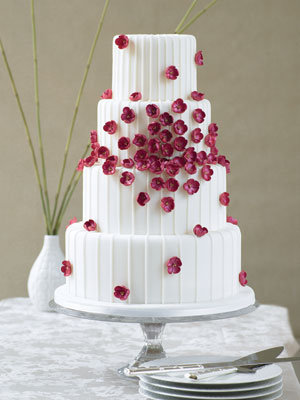 No Shrinking Violet Dainty plum blossoms decorate this elegant white cake