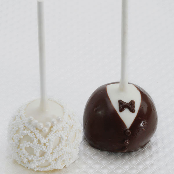 Bride and groom cake pops from Sweet E 39s Bake Shop LA sweetesbakeshopcom 