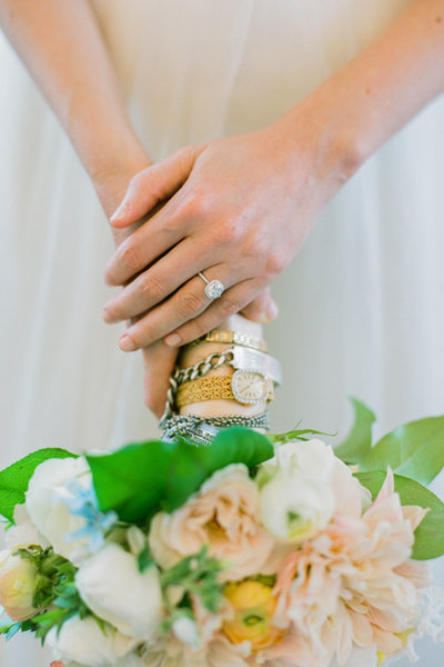 Grandmas wristwatch wrapped around bridal bouquet