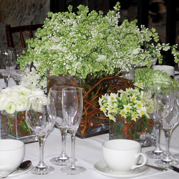 Types of Flowers Vases of curly willow branches lilac and calla lilies