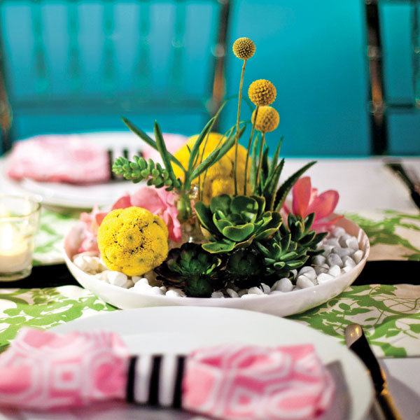 low centerpieces Types of Flowers A bed of white rocks topped with 