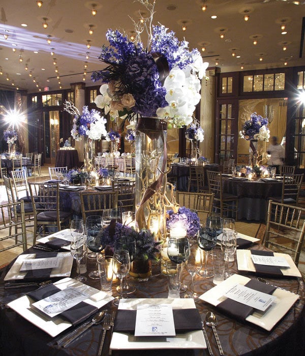 Towering centerpieces perfect for a highceilinged space add drama and 