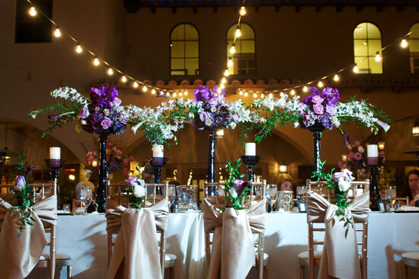 Towering centerpieces perfect for a highceilinged space add drama and 