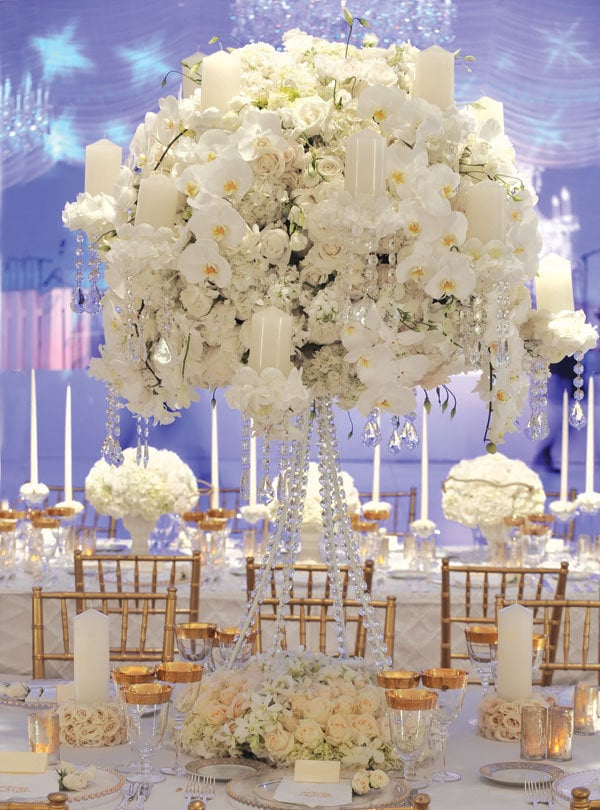 Towering centerpieces perfect for a highceilinged space add drama and 