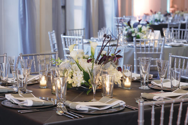 The centerpieces were a study in contrasts The flowers orchids and 