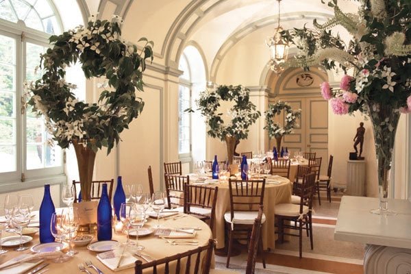 Towering centerpieces perfect for a highceilinged space add drama and 