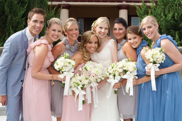 beach wedding bridal party The bride with her man of honor and bridesmaids