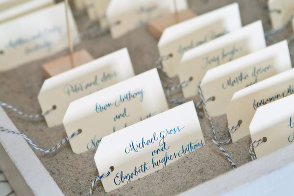 beach wedding escort cards Guests loved the whimsical display of escort 
