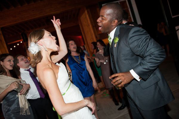 bride and groom singing at wedding