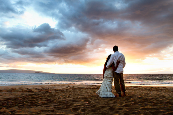 bride and groom at sunset