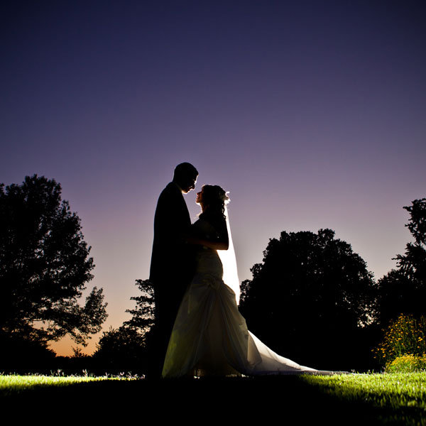 bride and groom at dusk