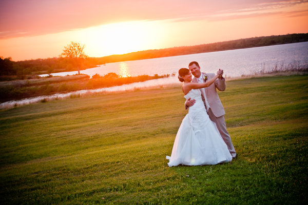 bride and groom at sunset