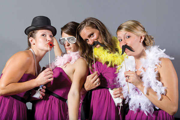bridesmaids in photo booth
