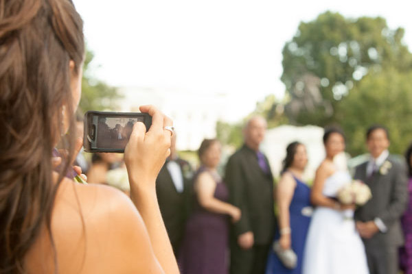 wedding guest taking picture