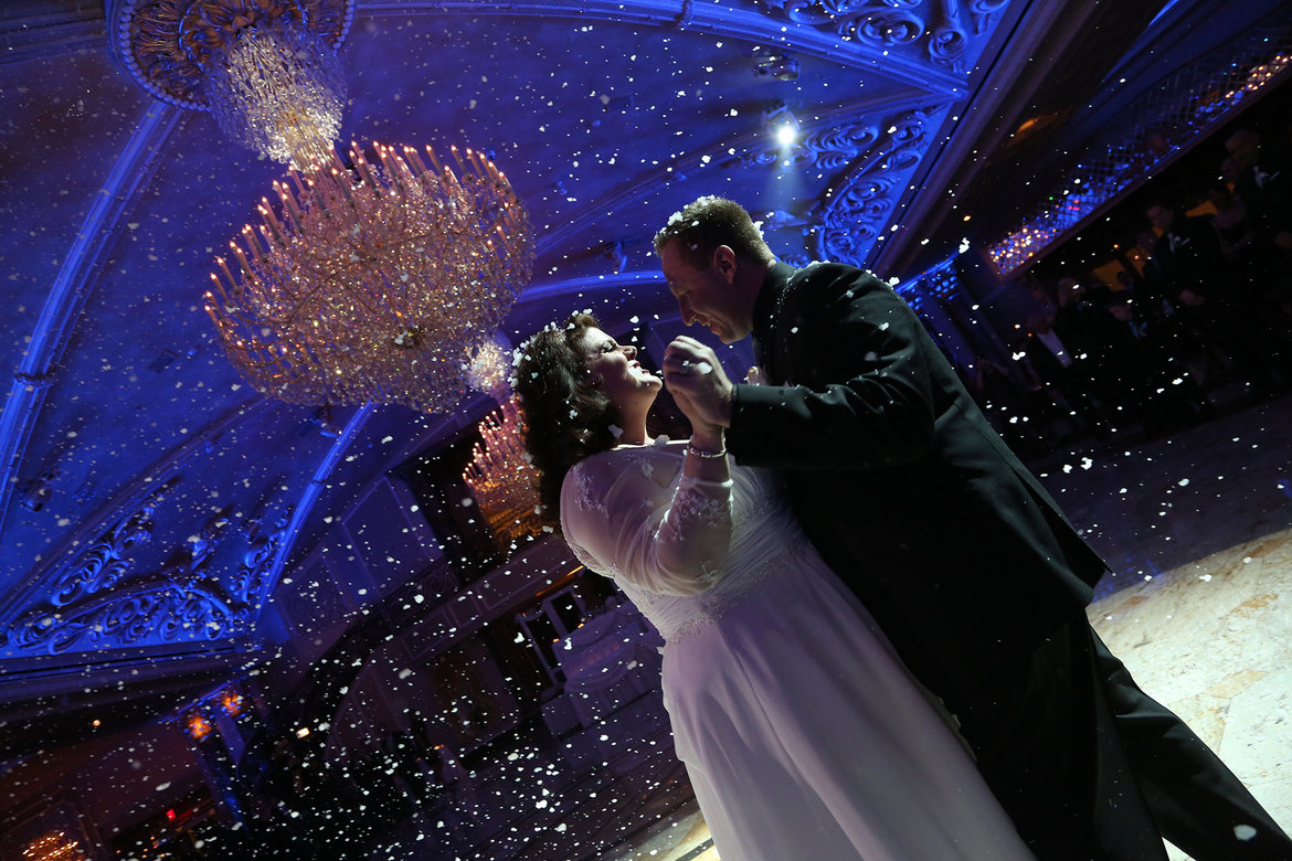 snow during first dance at wedding