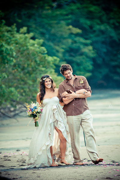 boho-chic bride with her groom 
