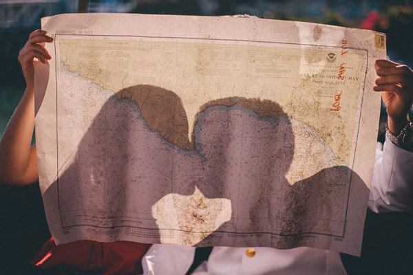 couple holding a map