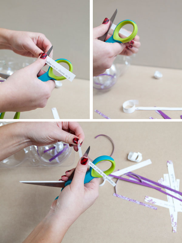 curl the strips of invitation with scissors 