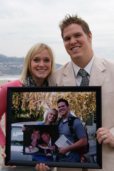 couple holding photo frame