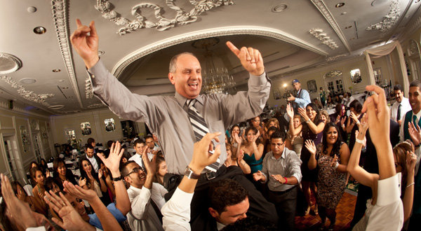 father of the bride dancing at wedding