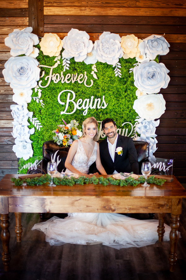 Greenery and paper flower wedding background