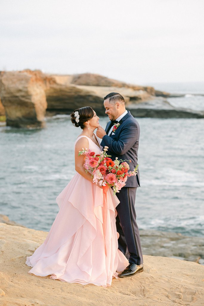 pink wedding gown on the beach
