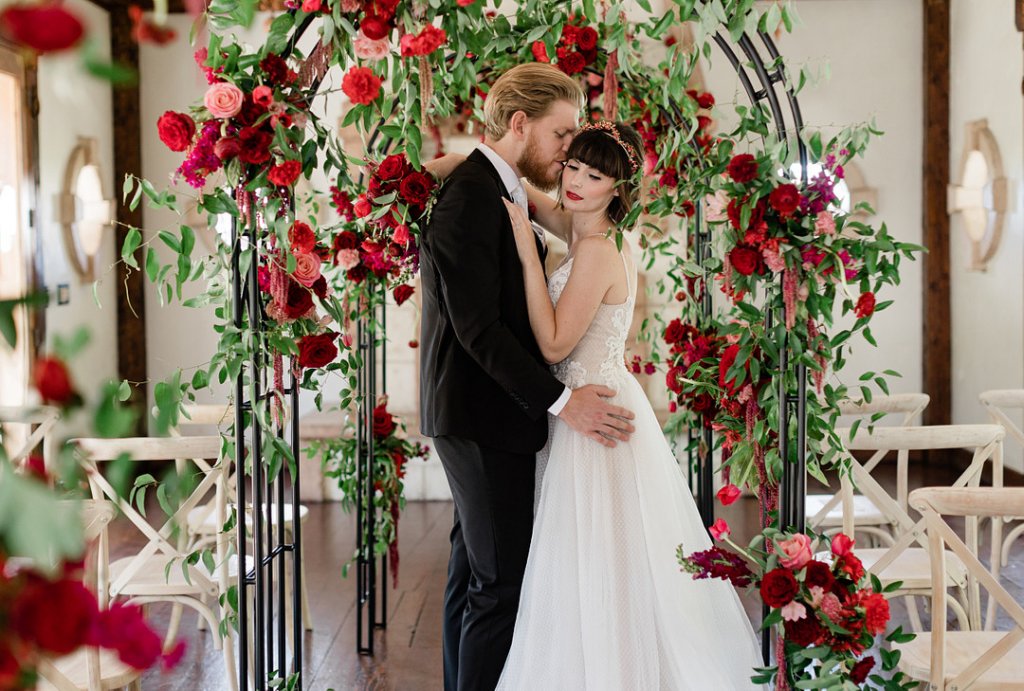 red roses wedding ceremony decor