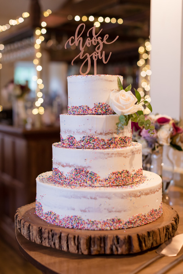 Rainbow sprinkles on wedding cake