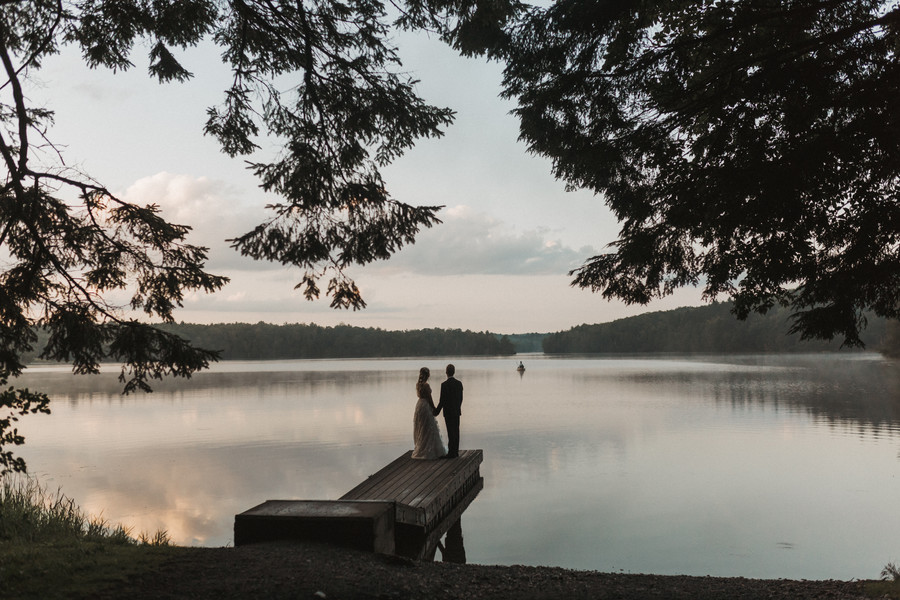 Bride and groom on a pier