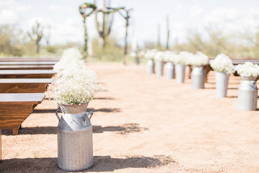 Rustic wedding ceremony aisle decor