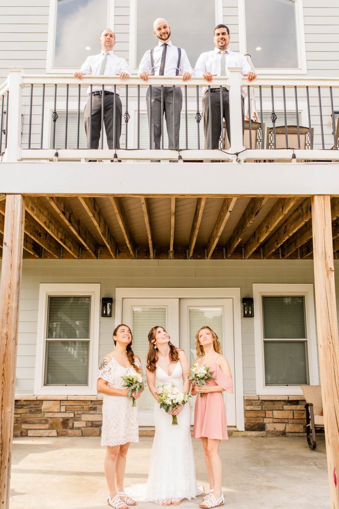 Bridal party photo on deck