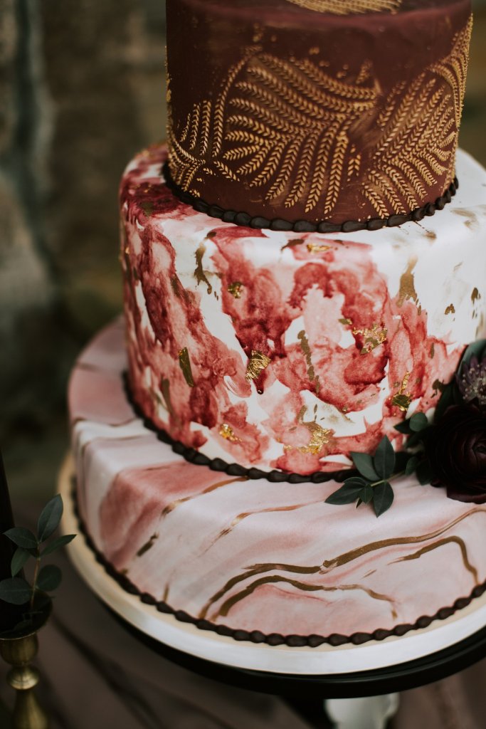 Rustic painted wedding cake