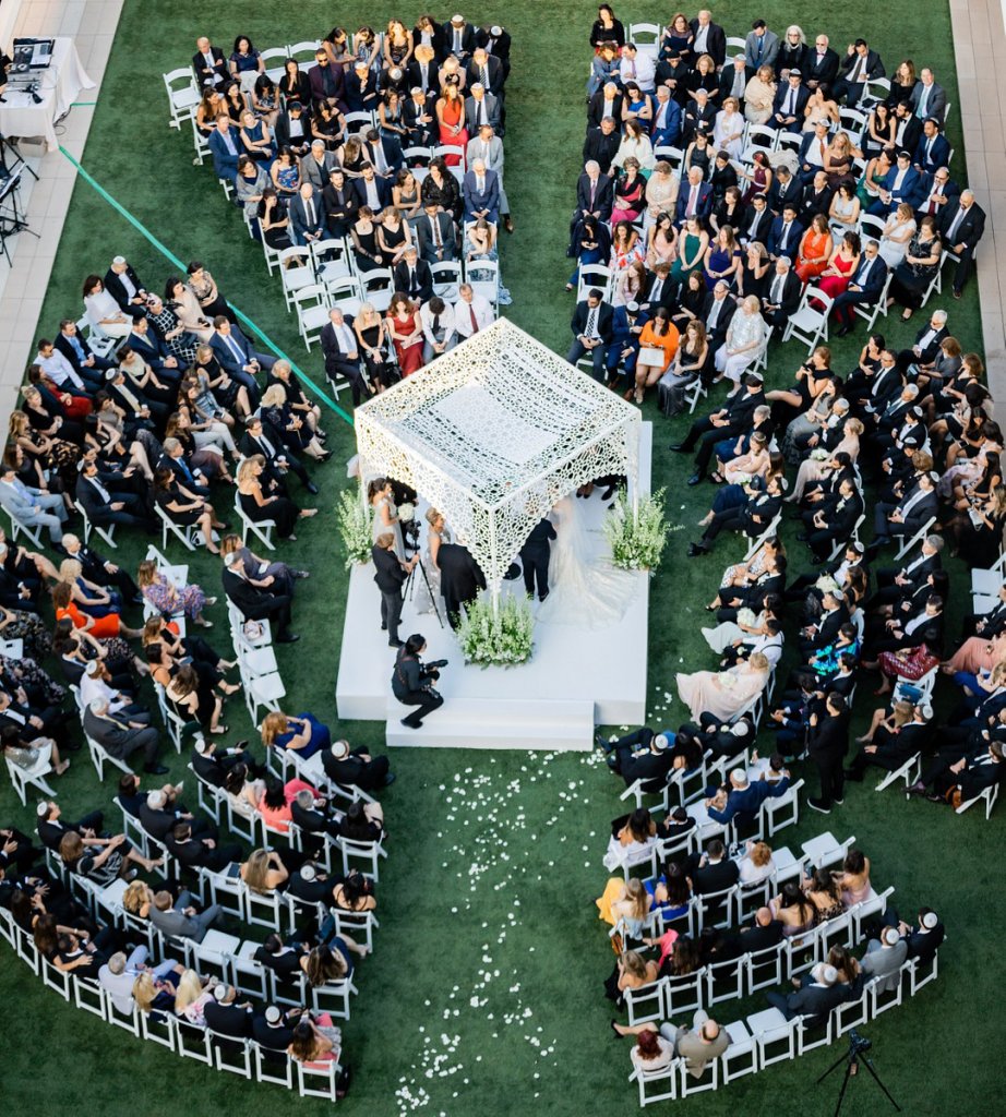 Ceremony seating surrounding couple