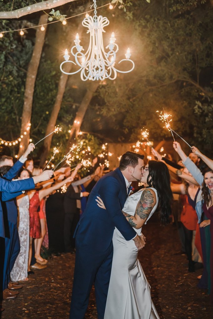 Outdoor chandelier wedding photo